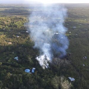 Lava is shown burning in Leilani Estates subdivision near the town of Pahoa on Hawaii’s Big Island. | U.S. Geological Survey via AP