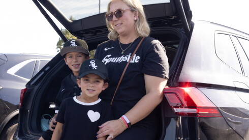 Former Cubs fan Corey Fennessy tailgates with her kids Mo and Jane outside Rate Field, Tuesday, Oct. 6, 2026.