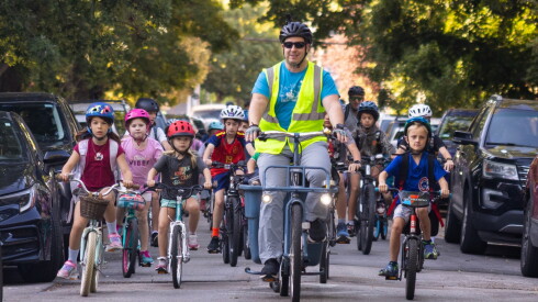 A bike bus heads to Waters Elementary School.