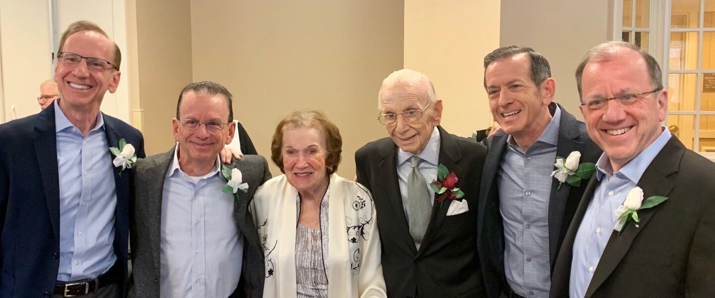 Earl and RoseLee Deutsch and their four sons in 2019 when the couple renewed their wedding vows. They’d been married for 70 years at the time of Earl Deutsch’s death in January.