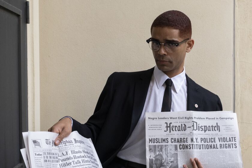 Kingsley Ben-Adir stars as Malcolm X in this scene from “One Night in Miami.”