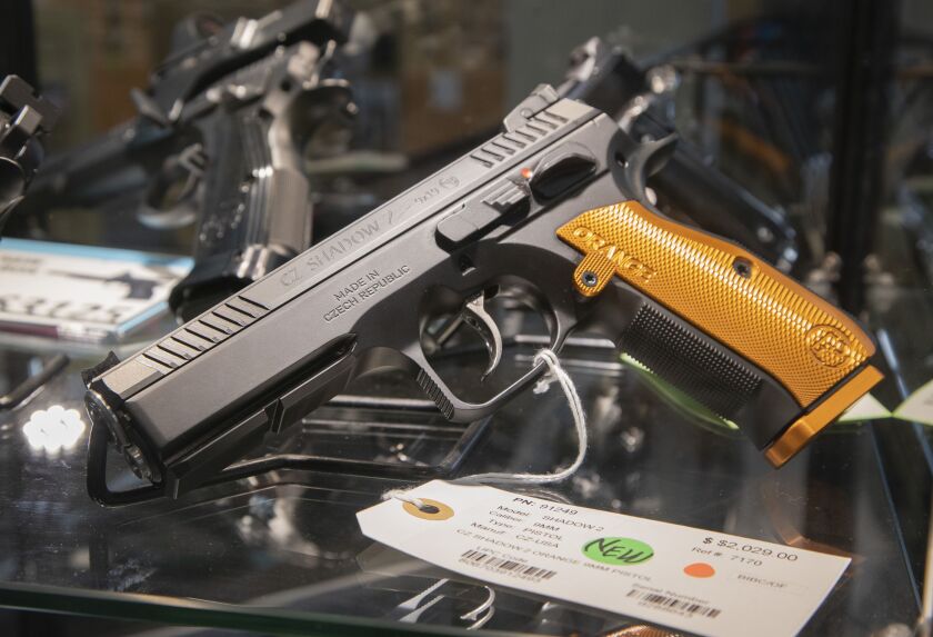 Firearms on display at Marengo Guns in Marengo in January.
