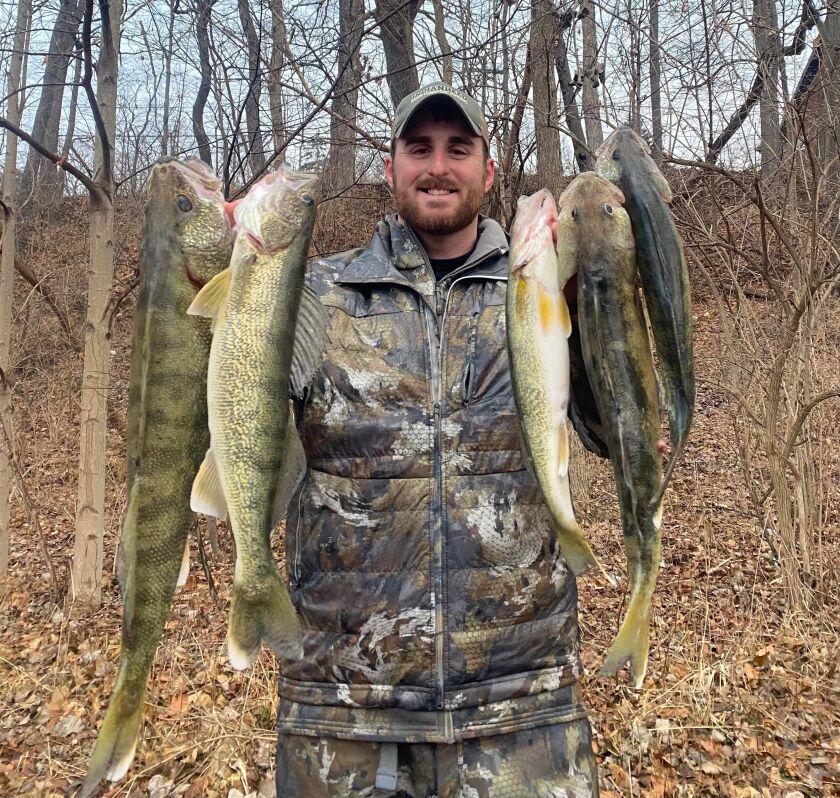 Capt. A.J. Cwiok with walleye fishing from shore on the St. Joseph River. Provided photo