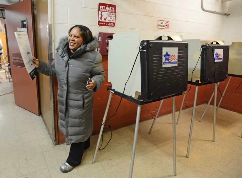 7th ward Alderman Natashia Holmes, with her finished ballot for todays election. Tuesday, February 24, 2015 | Brian Jackson/ Sun-Times