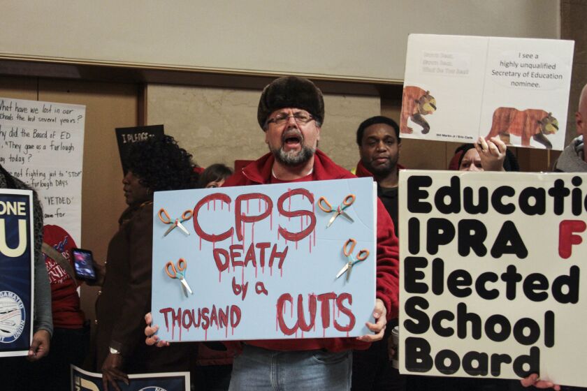 Craig Cleve, a bilingual teacher at Columbia Explorer Academy, joined other protesters at City Hall. | Maria Cardona/ Sun-Times