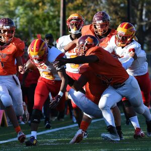 North Lawndale’s Lawrence Winters (19) runs back a fumble. Worsom Robinson/For the Sun-Times.