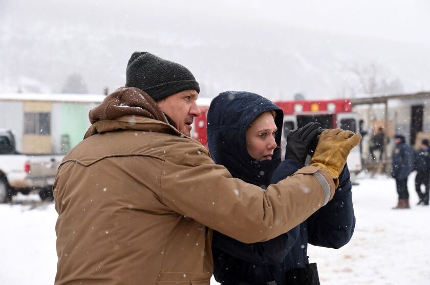Jeremy Renner and Elizabeth Olsen star in “Wind River.” | THE WEINSTEIN CO.