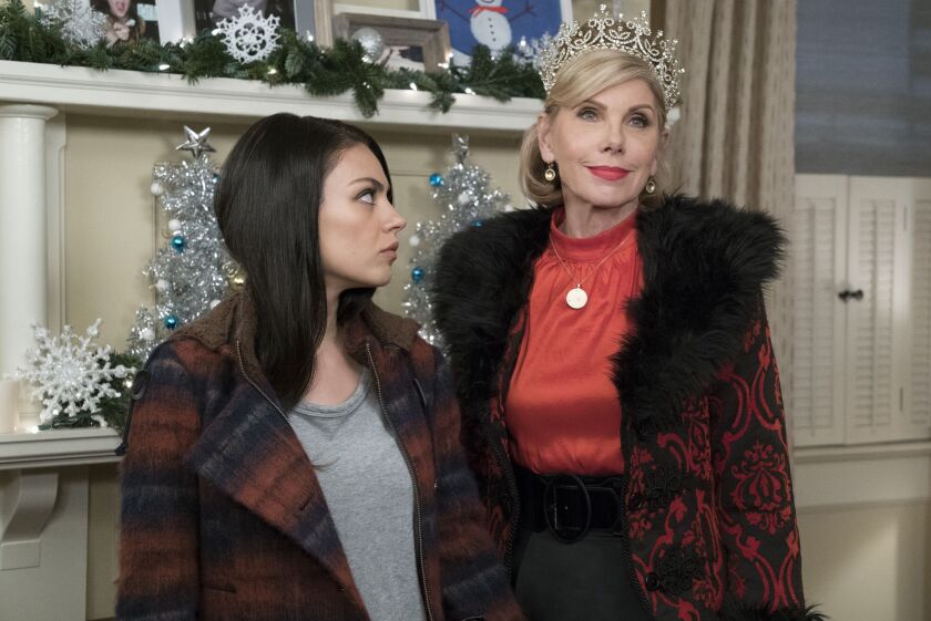 The three heroines of “A Bad Moms Christmas” are visited by their own mothers, the worst of whom is the monster (Christine Baranski, right) who raised Amy (Mila Kunis). | STX ENTERTAINMENT