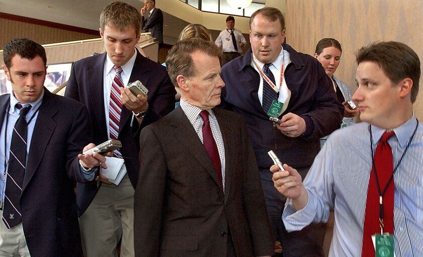 Illinois House Speaker Michael Madigan, D-Chicago, center, is surrounded by the media in Springfield in 2005.