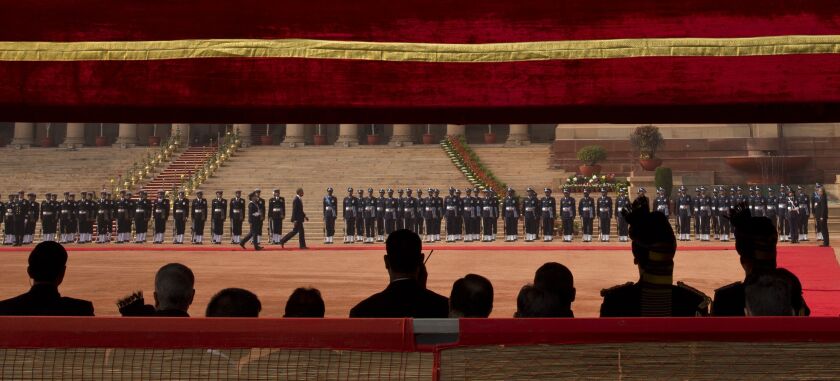 U.S. President Barack Obama inspects a Guard of Honor during a ceremonial reception at the Indian Presidential Palace in New Delhi, India, Sunday, Jan. 25, 2015. (AP Photo/Saurabh Das)