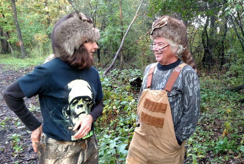 Kathy and Pat O’Byrne share a moment while picking mushrooms.<br>Dale Bowman/Sun-Times
