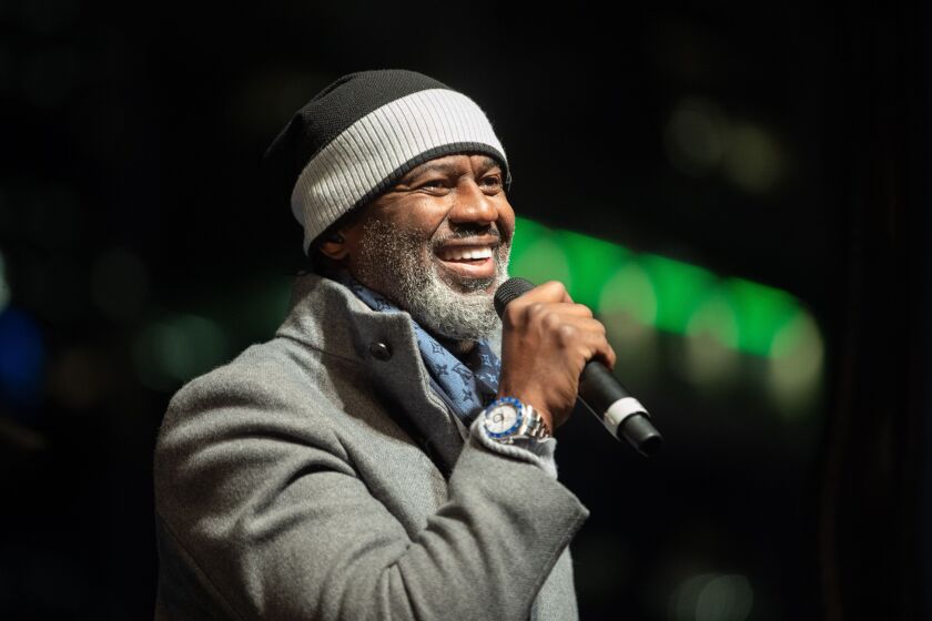 Singer Brian McKnight performs at Friday’s Christmas tree-lighting ceremony in Millennium Park.
