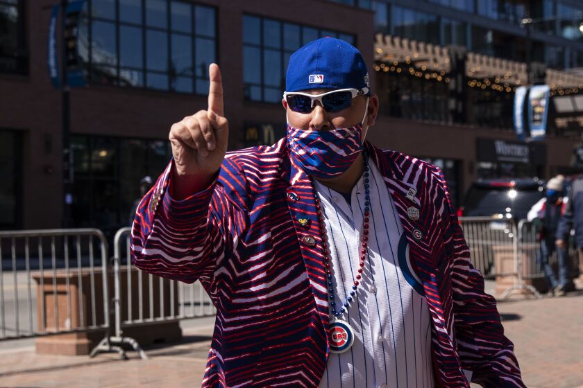 Fans enter Wrigley Field before the Chicago Cubs Opening Day game against the Pittsburgh Pirates.