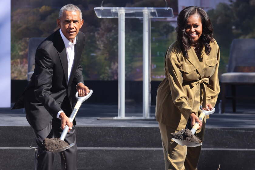 Former President Barack Obama and former first lady Michelle Obama participate in a ceremonial groundbreaking at the Obama Presidential Center in Jackson Park on Sept. 28, 2021, on the South Side.