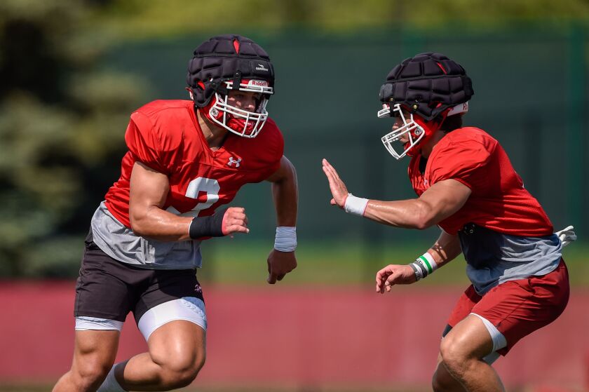Hinsdale Central’s Sean Allison (3) runs drills at football practice on August 13, 2021.