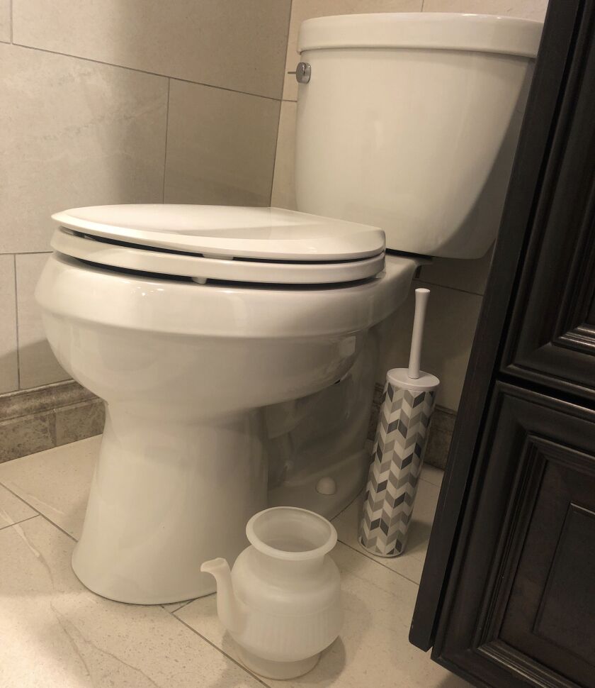 A lota from a bathroom of the author’s childhood home.
