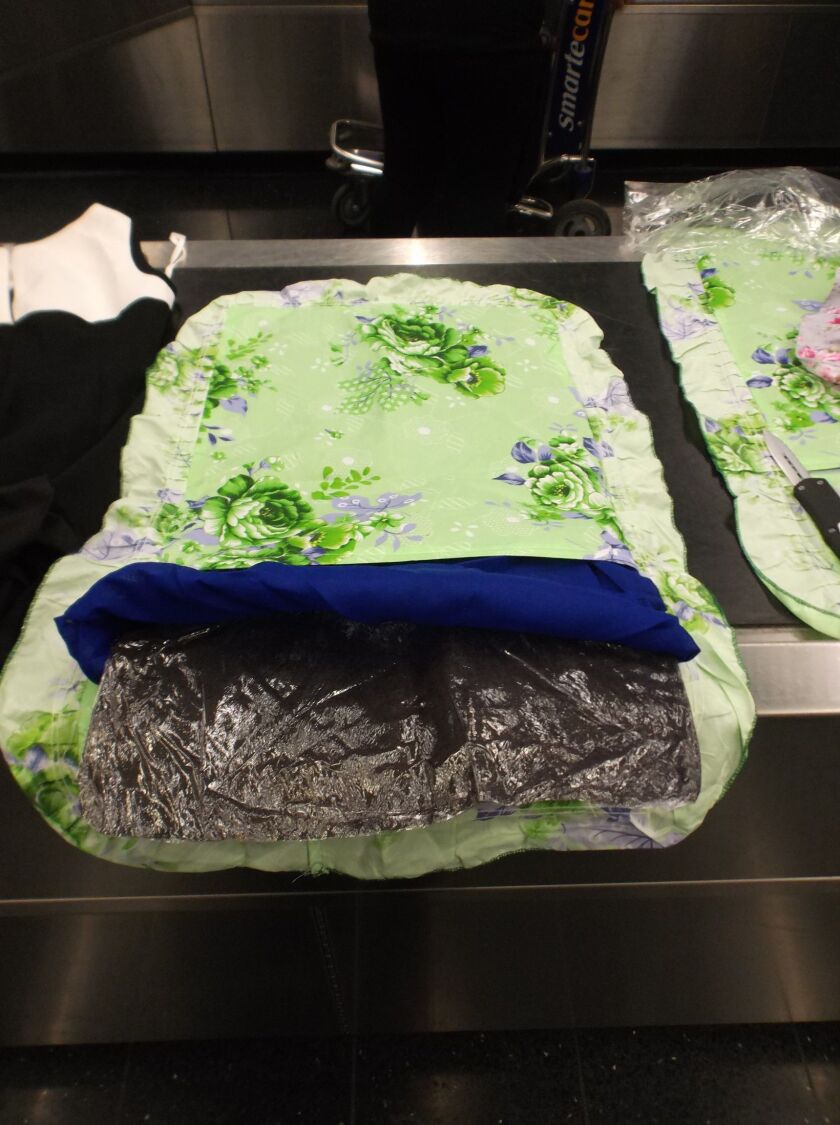 A Minnesota woman was arrested after 17 kilos of opium were discovered in her luggage Saturday at O’Hare. | Cook County sheriff’s office