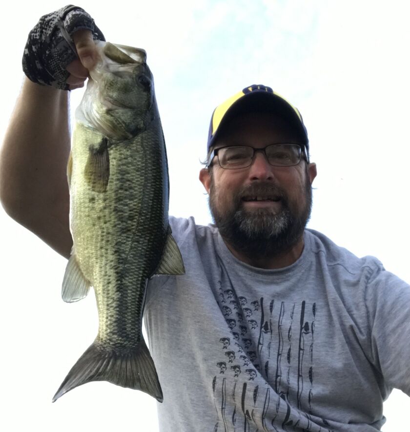 Ken “Husker” O’Malley with a fall largemouth bass. Provided photo