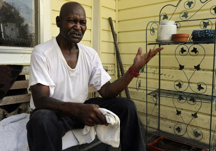 Robey Bartee returned for the first time to his flooded-out home in Houston on Friday. Bartee was happy to leave a shelter where he spent nearly a week, but the damage to his house was worse than he expected and he plans to return to the shelter. A line o