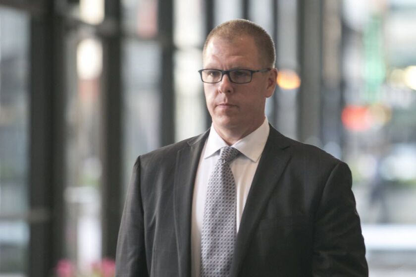Gary Solomon, executive director of principal-training firm SUPES Academy, leaves federal court after his arraignment Oct. 14. | Ashlee Rezin / Sun-Times