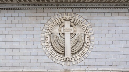 Architectural detail of a cross in the brick structure of the Metropolitan Missionary Baptist Church.