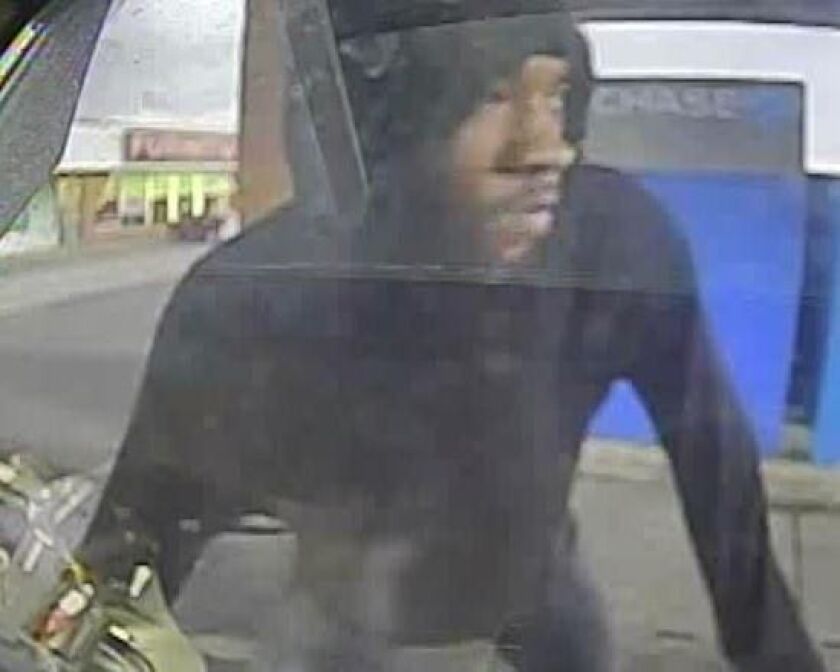 Surveillance image of a suspect in the robbery of an ATM Thursday outside a Chase Bank branch in Calumet City. | FBI
