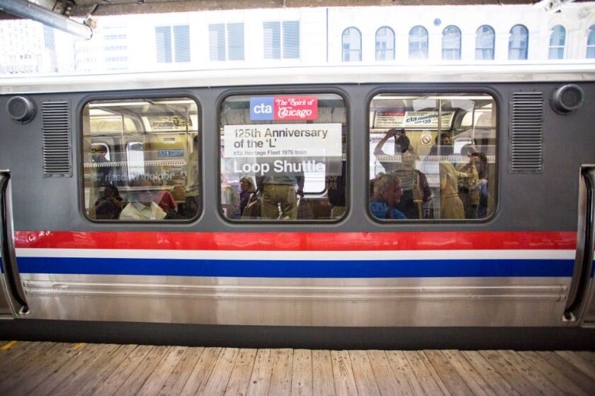In honor of the 125th anniversary of the CTA’s elevated system a vintage 2400-series train was operated in the loop Tuesday, June 6th, 2017. | James Foster/For the Sun-Times
