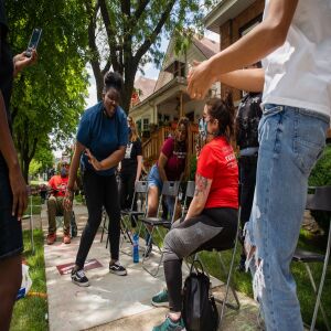 Youth activists dance in front of Chicago Board of Education President Miguel del Valle’s home in Belmont Cragin to demand an end to police presence in schools, Wednesday afternoon, June 24, 2020. The Chicago Board of Education is set to decide whether to end Chicago Public Schools’ $33 million contract with the Chicago Police Department and pull out police officers from schools.