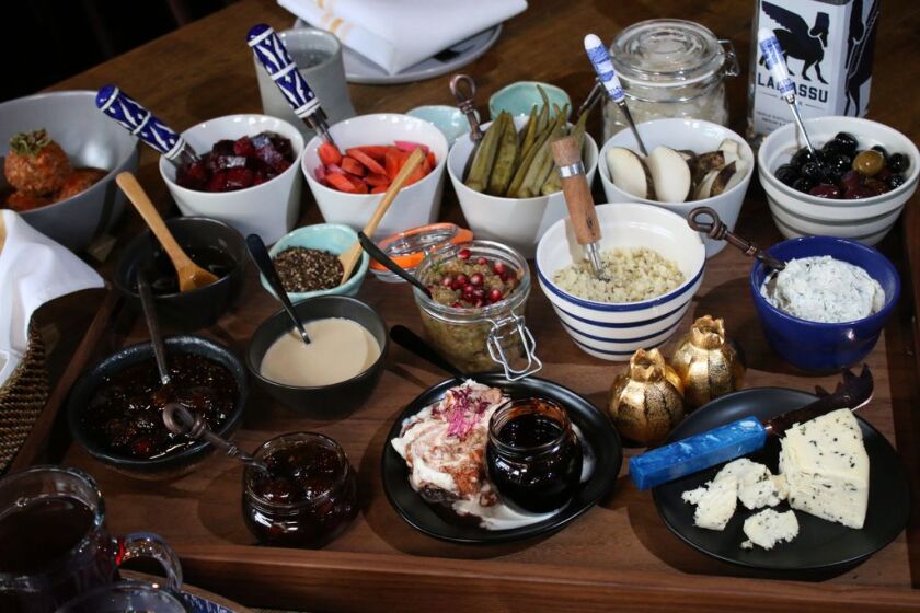 A spread of various pickled vegetables (oregano carrots, basil-infused okra, thyme-soaked black turnips), spreads, olives, preserves, cheeses, yogurt and tapenade, served at Assyrian Kitchen in Jefferson Park. | Brian Rich/Sun-Times
