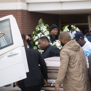 Pall bearers hoist the casket with the remains of Jemel Roberson into the hearse, after the funeral for Jemel Roberson, Saturday, Nov. 8, 2018, in Chicago. | Tyler LaRiviere/Sun-Times