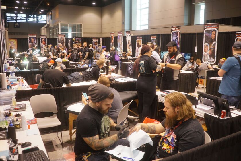 Fans get “Star Wars”-themed tattoos at the Tattoo Pavilion at Star Wars Celebration 2019 at Chicago’s McCormick Place West. | Brian Rich/Sun-Times