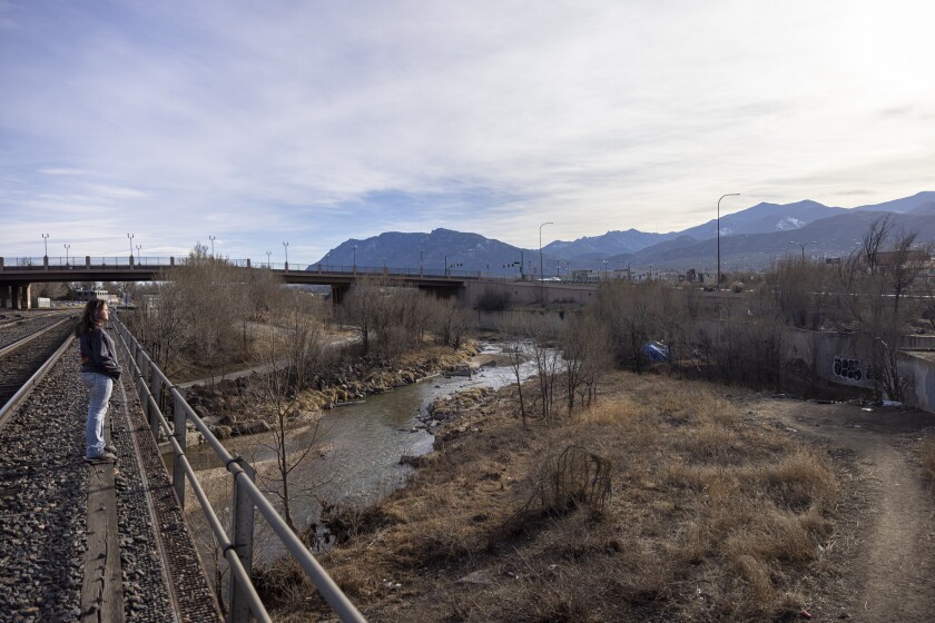 Lottie Elliott on a bridge in Monument Valley Park in Colorado Springs, Colo.