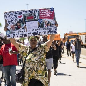 Protesters pour onto the Dan Ryan Expressway Saturday morning. | Ashlee Rezin/Sun-Times