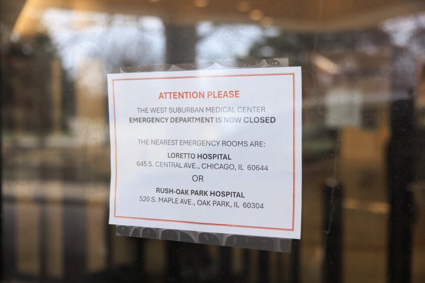 A sign at West Suburban Medical Center on April 1 alerting patients of its closure.