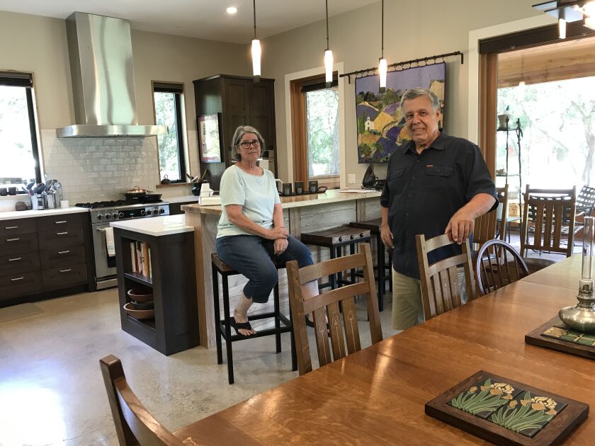 Don and Lynn Dille of Austin, Texas, both in their 70s, built an energy-efficient home to age in place, with hard floors throughout, 36-inch-wide doorways and open living areas for easy maneuvering should either need a wheelchair.