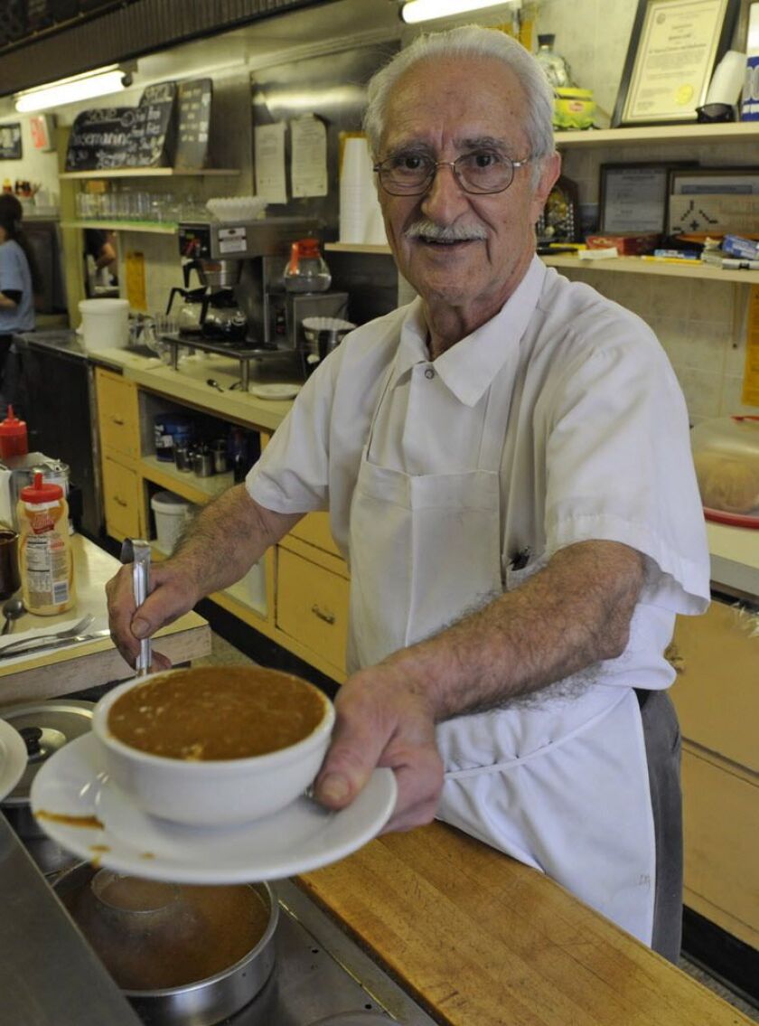 Tony Dinos, in 2012, with his famous chili at the Ramova Grill, 3510 S. Halsted St. in Bridgeport. | Sun-Times files