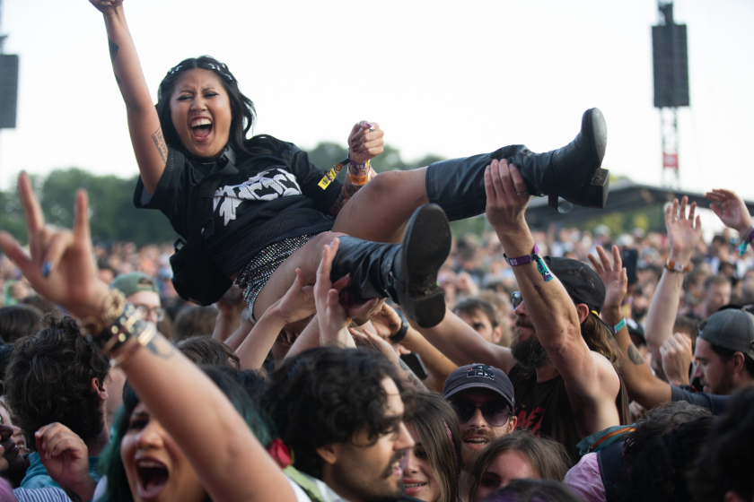 This November's ballot will ask voters if Chicago should develop a permanent festival and outdoor event space for large-scale events, including Lollapalooza. Here, a fan crowd-surfs during Turnstile's Lolla set in August.