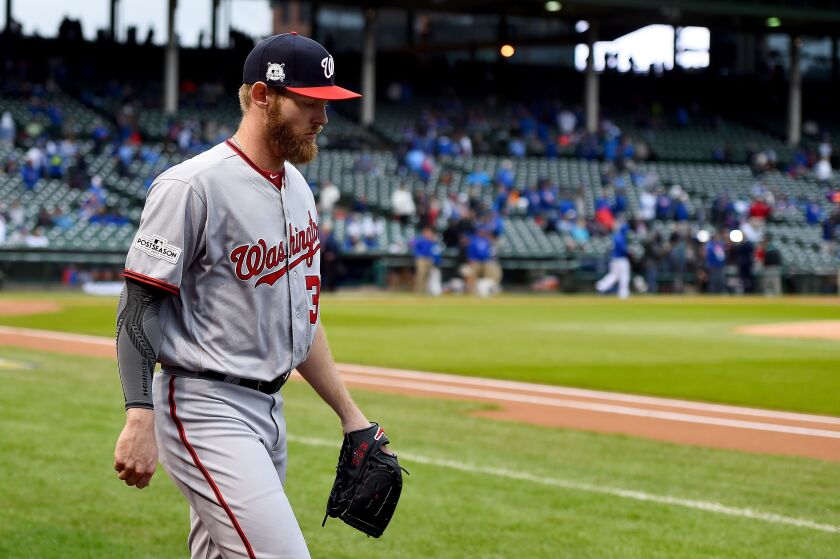 <em>Stephen Strasburg makes way to bullpen to warm up. (Getty Images)</em>