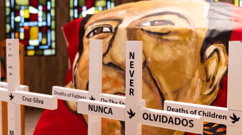 Crosses bearing the names of people who have died in immigration custody or during an enforcement action since 2020.