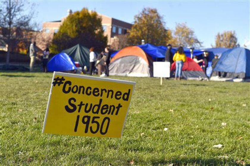 A sign is posted at a site where student protesters have put up tents on the University of Missouri campus on Sunday, Nov. 8, 2015, in Columbia, Mo. | Allison Long/The Kansas City Star via AP