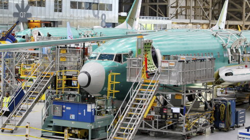 Boeing 737 MAX aircraft are shown on an assembly line in 2024.