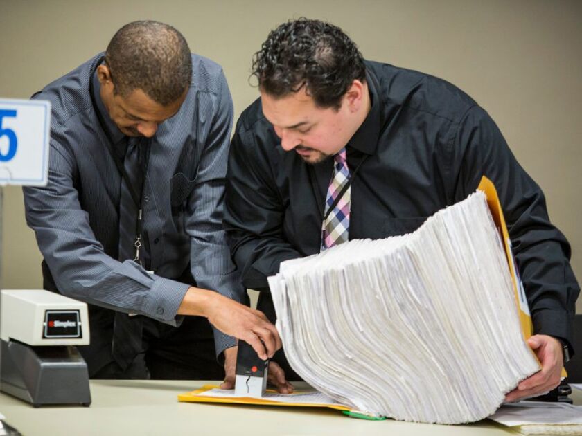 Election officials certify receipt of a petition for mayor on the first day of the filing period for Municipal Elections, Monday, November 19th, 2018. | James Foster/For the Sun-Times