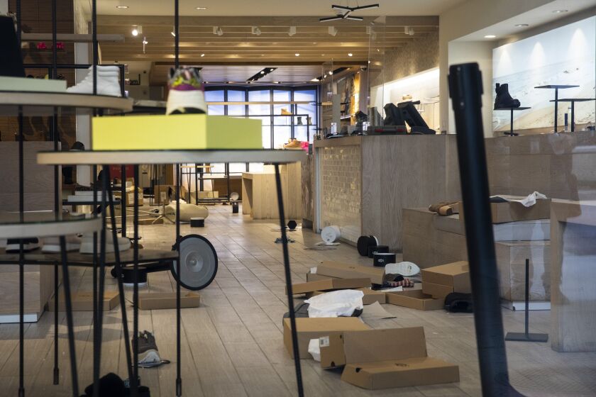 An Ugg store at 545 N. Michigan Ave. on the Magnificent Mile after looting broke out overnight in the Loop and surrounding neighborhoods, Monday morning, Aug. 10, 2020.