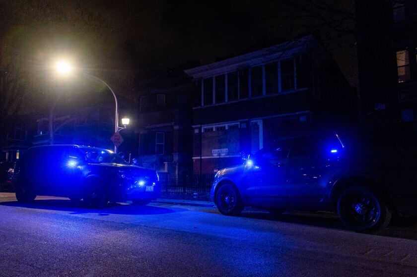 Chicago Police investigate the scene where a man was shot, Saturday night, in the 6200 block of South Rhodes, in the West Woodlawn neighborhood. | Tyler LaRiviere/Sun-Times