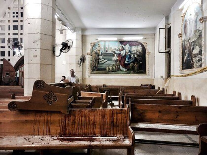 Blood stains pews inside the St. George Church after a suicide bombing, in the Nile Delta town of Tanta, Egypt on Sunday. Bombs exploded at two Coptic churches in the northern Egyptian cities of Tanta and Alexandria as worshippers were celebrating Palm Su