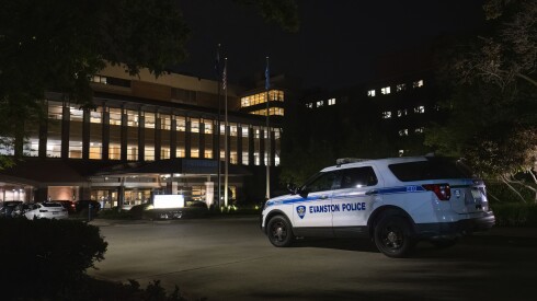 An Evanston police car sits outside Endeavor Health Evanston Hospital after a security officer was shot in the emergency department by a patient brought in by police on June 5, 2025.