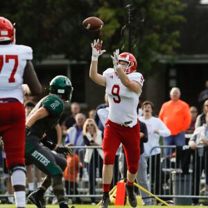 Hinsdale Central’s Mac Quast (9) catches a pass to score a touchdown against Glenbard West.