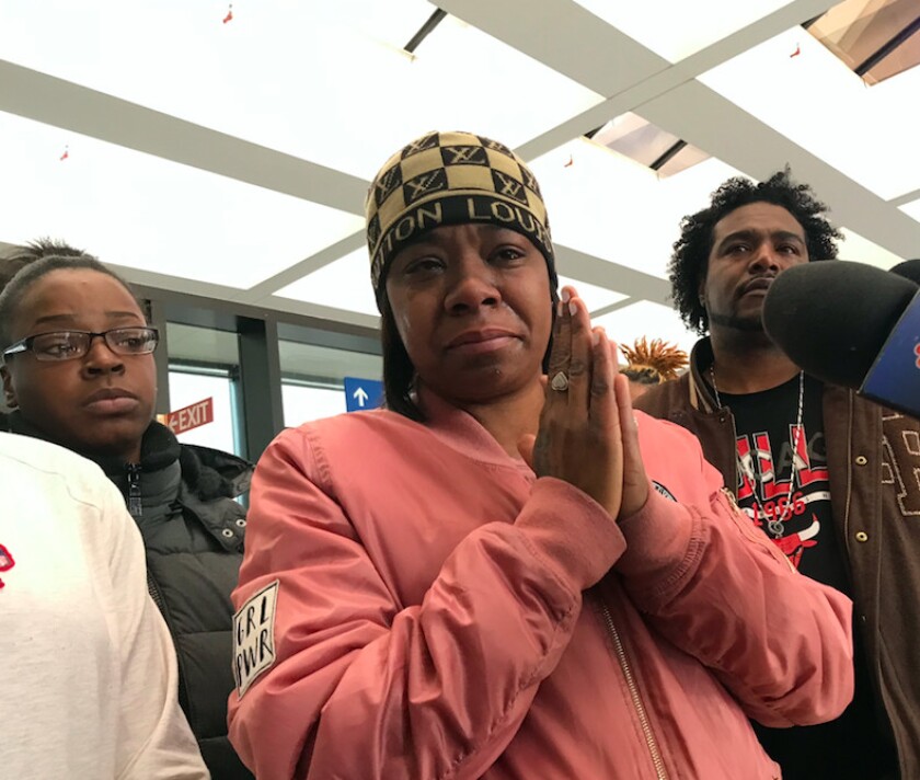 Sherie Kellum, the mother of Alvin Thomas, speaks after Thomas’ court hearing Tuesday at the Leighton Criminal Court Building.