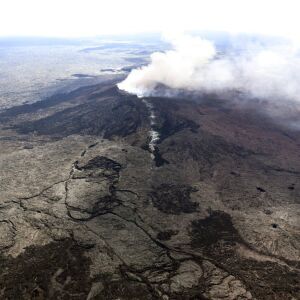 Ash plume rises above the Puu Oo crater, on Hawaii’s Kilaueaa Volcano. | U.S. Geological Survey via AP