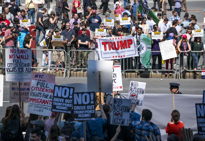 Demonstrators against Islamic law (shown in background) gather in New York Saturday as counter-demonstrators line up across Centre Street (foreground). | Craig Ruttle/Associated Press